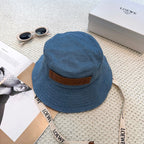 Denim bucket hat with embossed patch and detachable strap