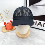 Black monogram lace baseball cap with curved brim