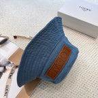 Denim bucket hat with embossed patch and detachable strap