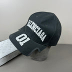 Charcoal cotton cap with varsity embroidery and sculpted brim