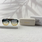 Geometric Gradient Sunglasses with Gold Accents for UV Protection