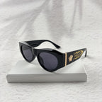 Classic Black Cat-Eye Sunglasses with Gold Baroque Temples