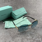 Elegant Rimless Blue Tint Sunglasses – Lightweight Gold Frame